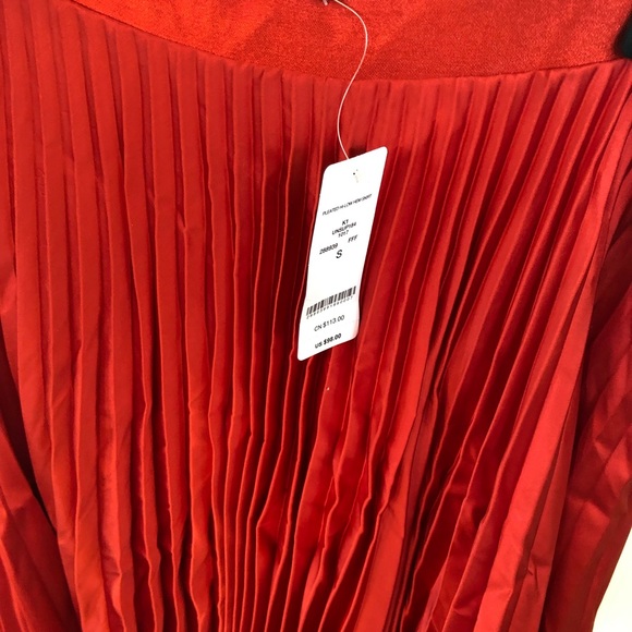 Bebe red pleated high low skirt. NWT - Picture 2 of 4
